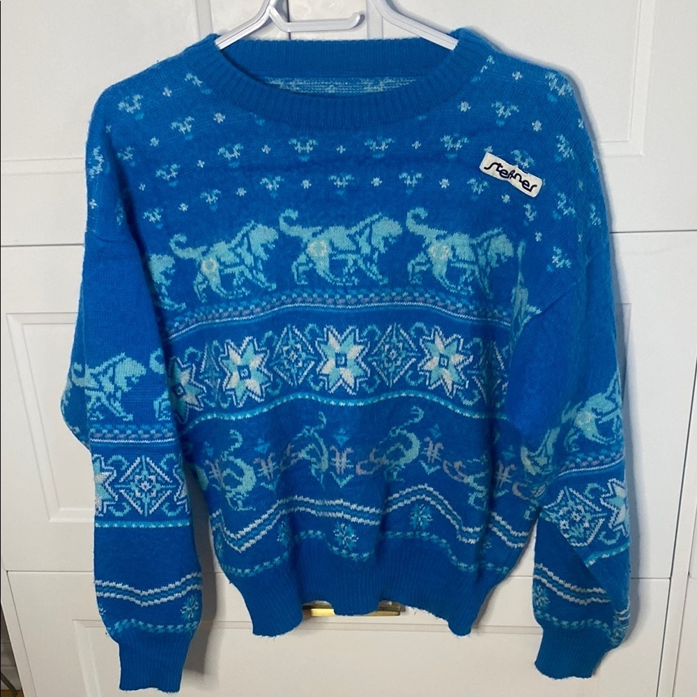 STEFFNER Blue Long Sleeved crewneck Sweater with Lion Design Size Large 50% Wool